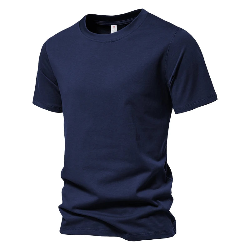 T-shirt homme basique 100 % coton – Coupe régulière, col rond.                  L’essentiel du quotidien : simple, confortable, intemporel.