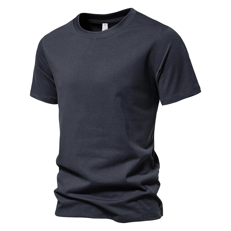 T-shirt homme basique 100 % coton – Coupe régulière, col rond.                  L’essentiel du quotidien : simple, confortable, intemporel.